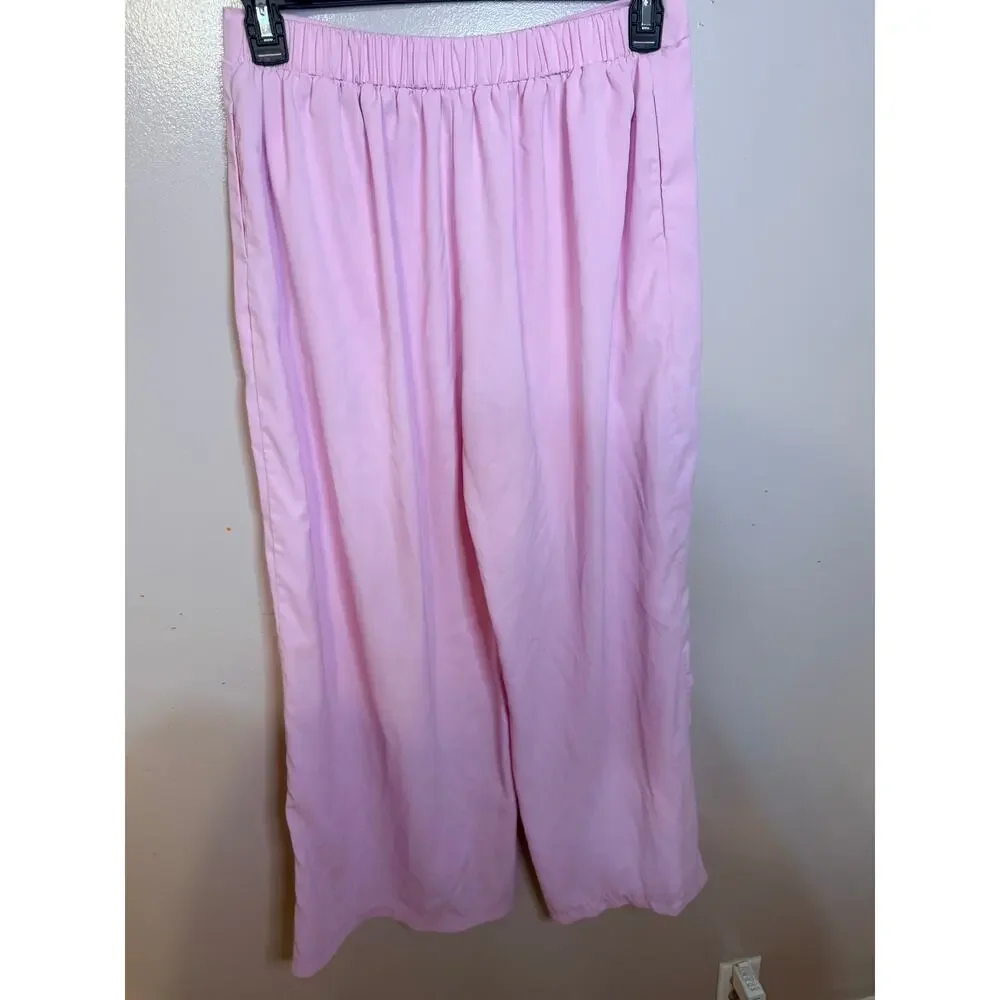 Pink two-piece batwing-sleeve pantsuit. Sparkling silver sequin trim. Size L.